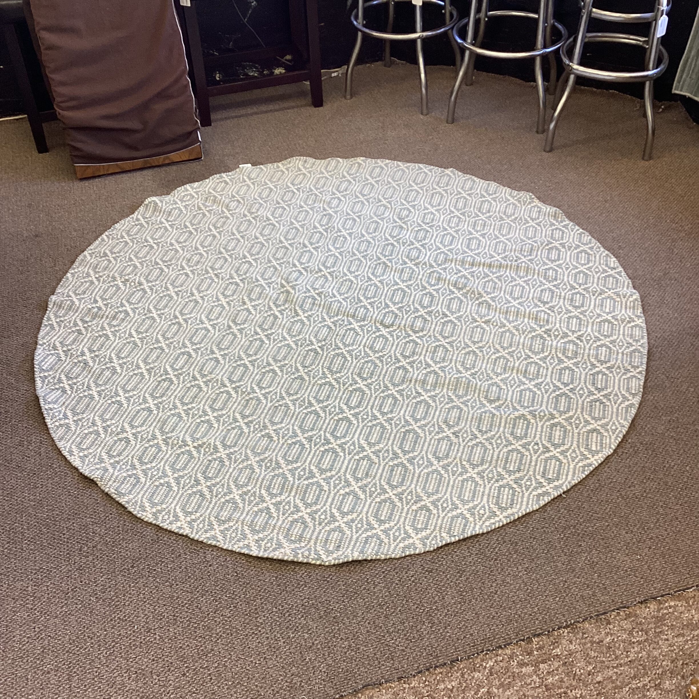 round light blue & white geometric rug