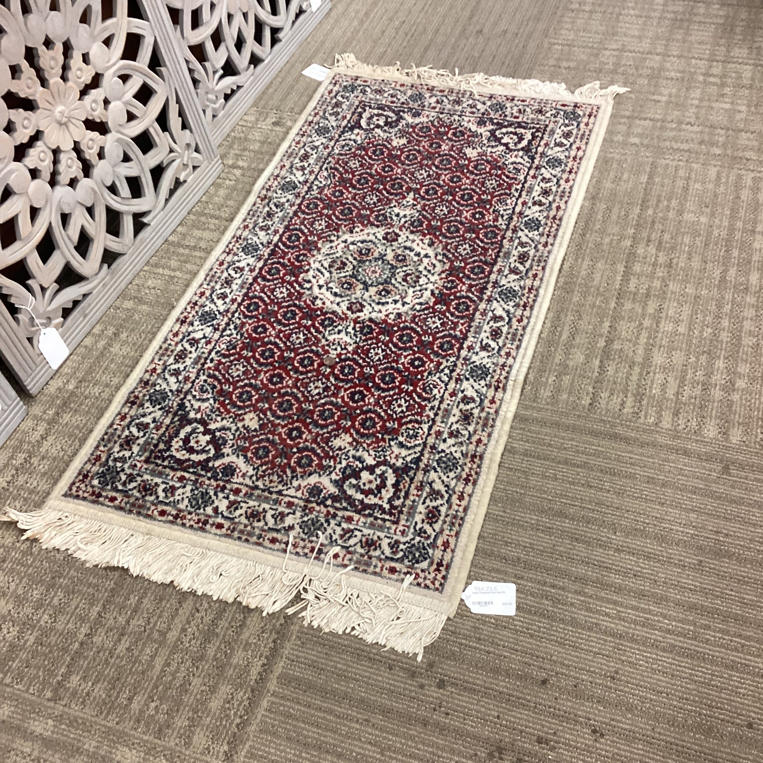 small traditional red rug