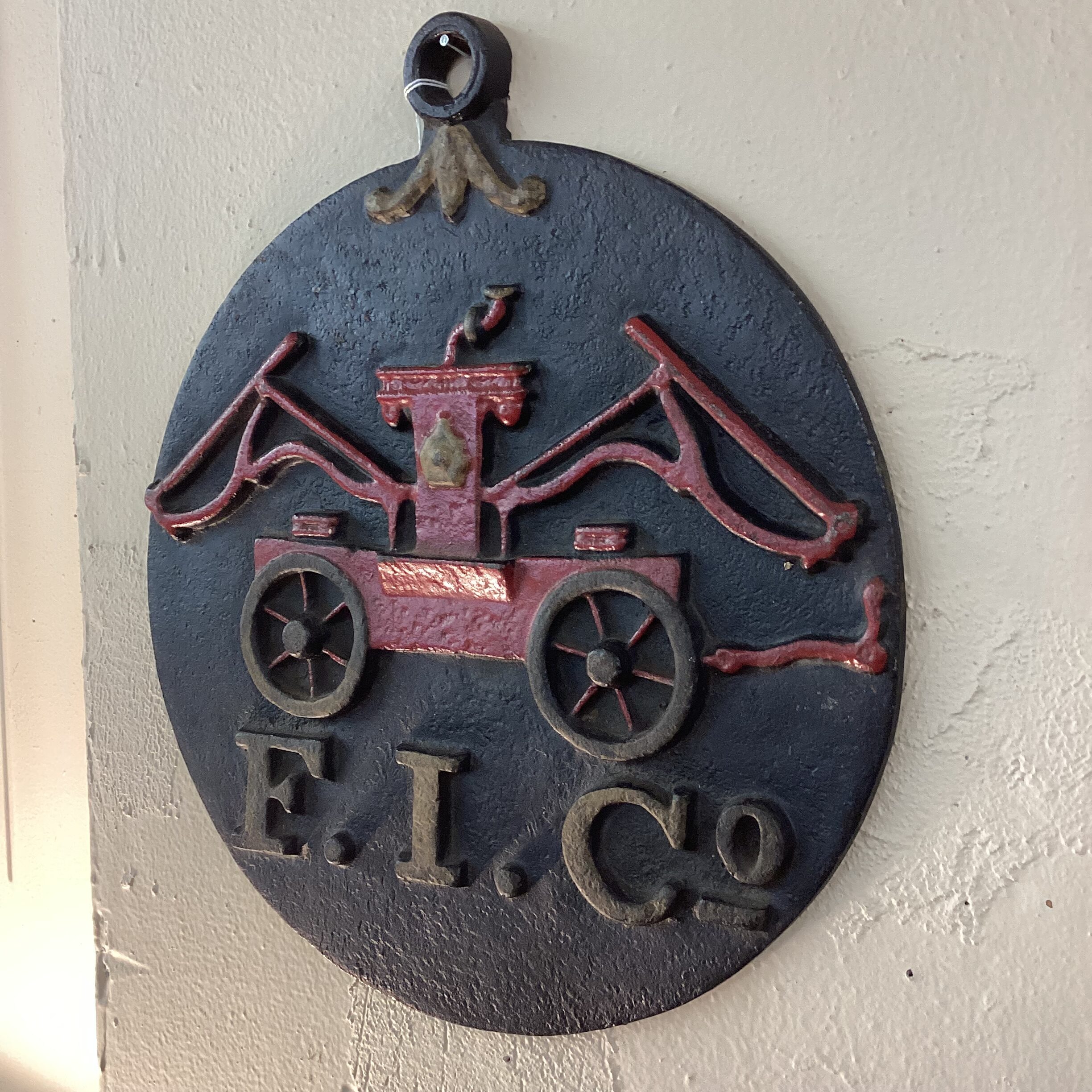 antique iron fire station sign
