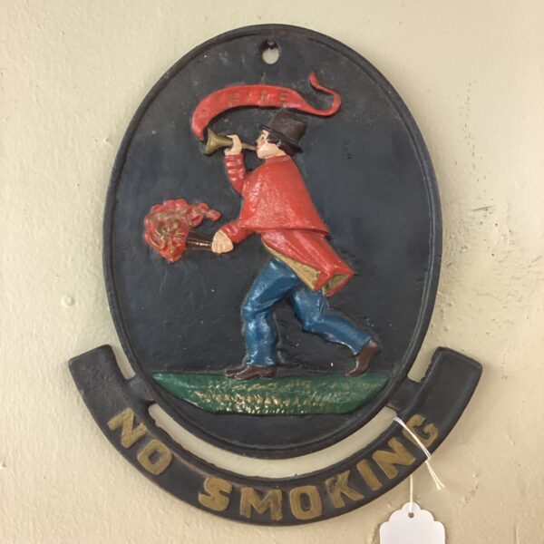 antique iron fire station sign