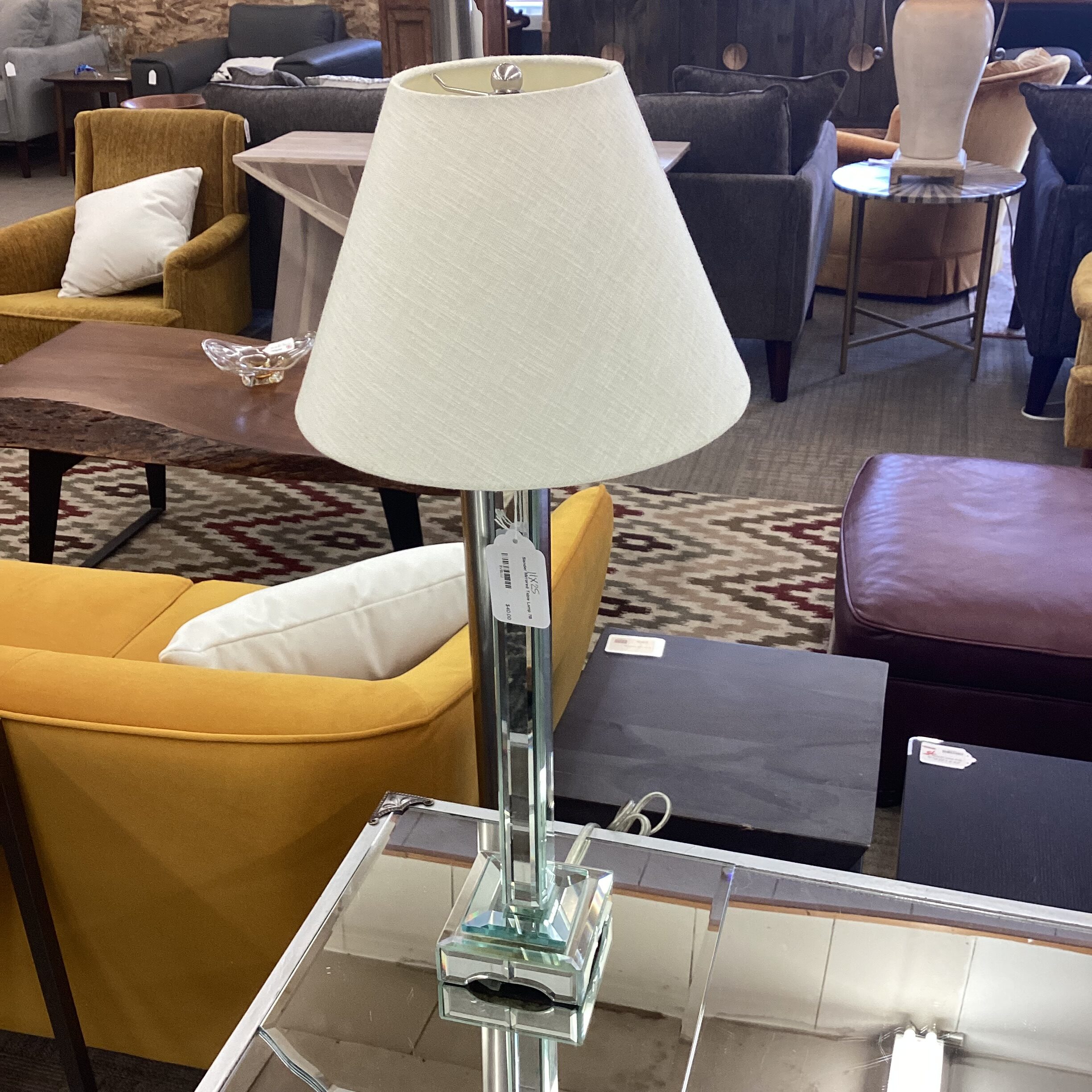 slender mirrored table lamp