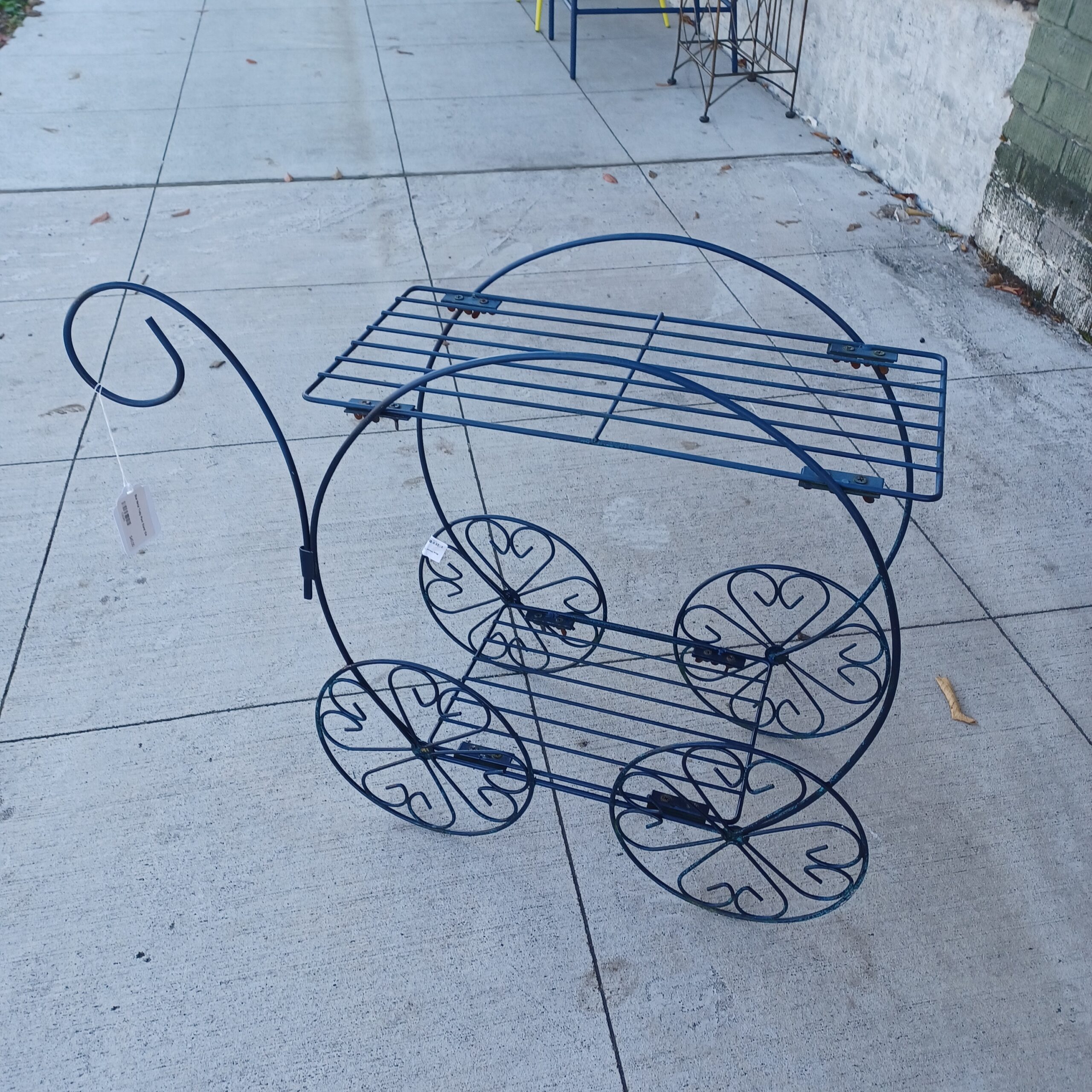 blue metal trolly plant stand