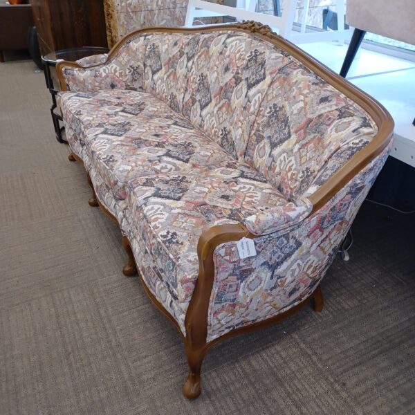 antique carved camel back sofa w/new upholstery