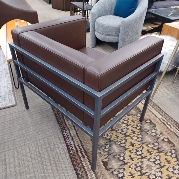 wide gun metal frame brown armchair