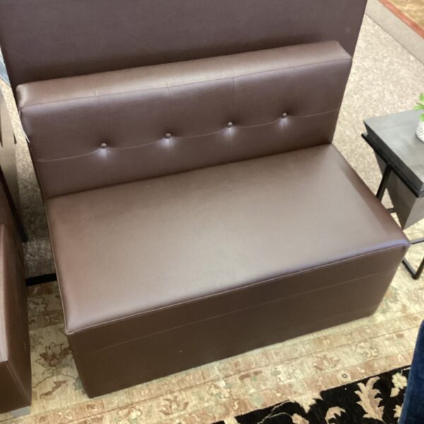 brown button tufted booth settee