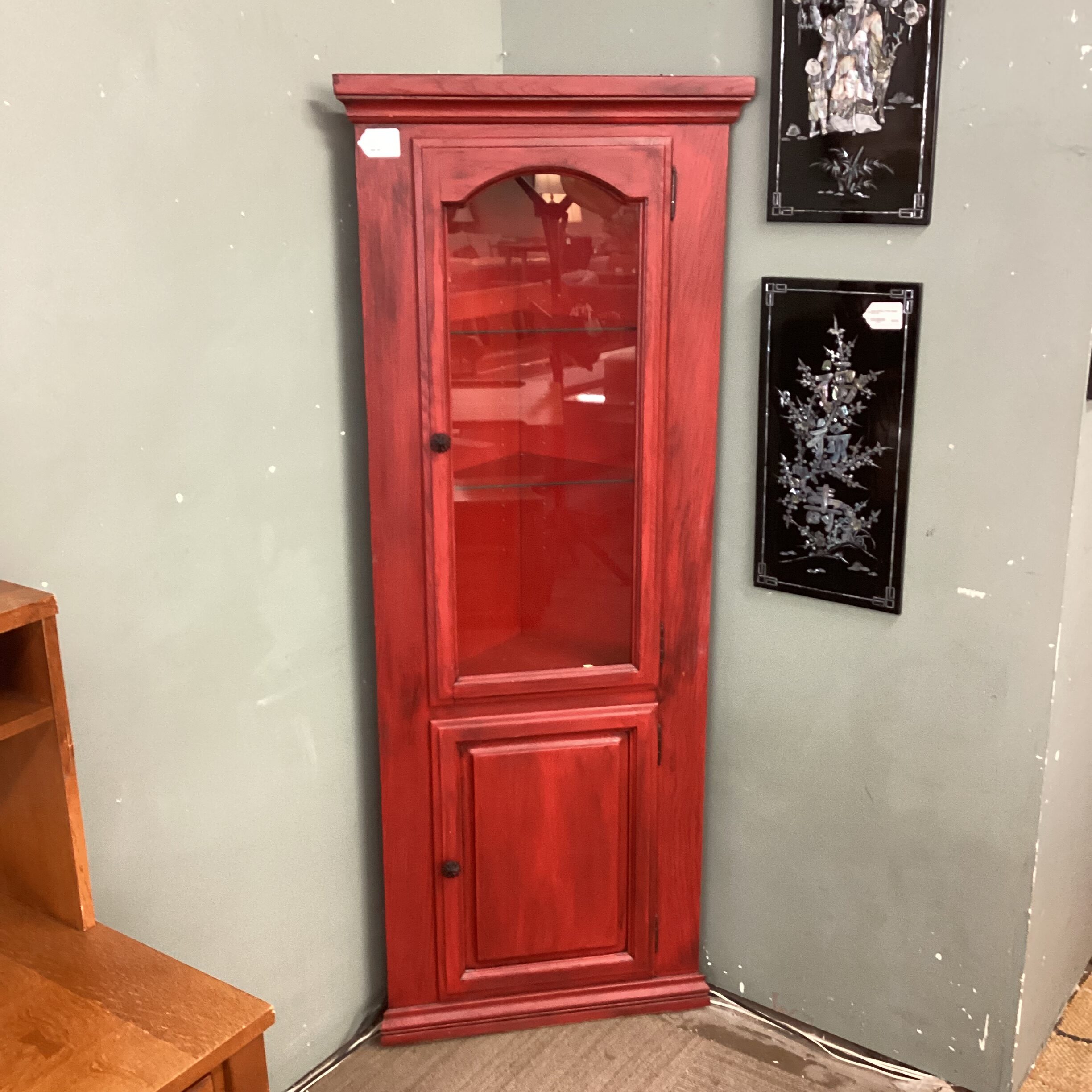 rustic red corner cabinet