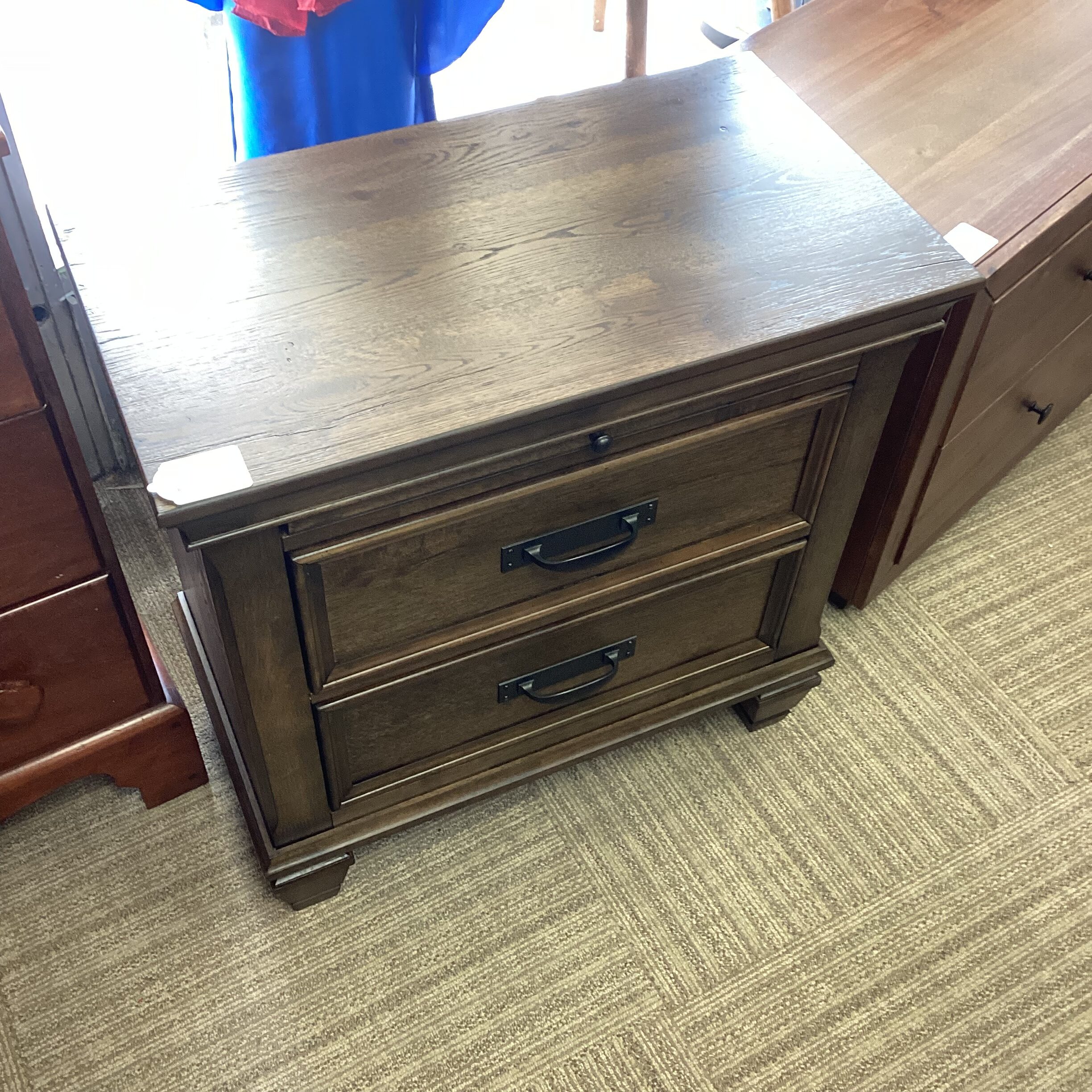 burnished oak nightstand with pull out tray