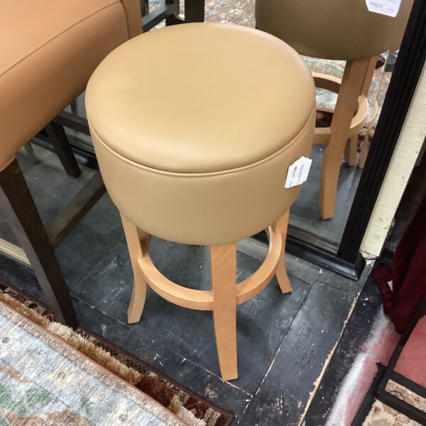 round tan leather blonde wood bar height stool