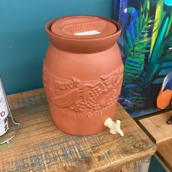 terracotta drink dispenser