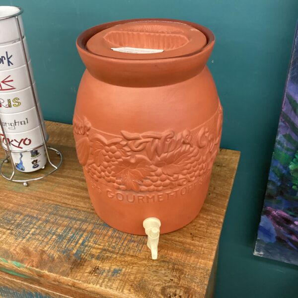 terracotta drink dispenser