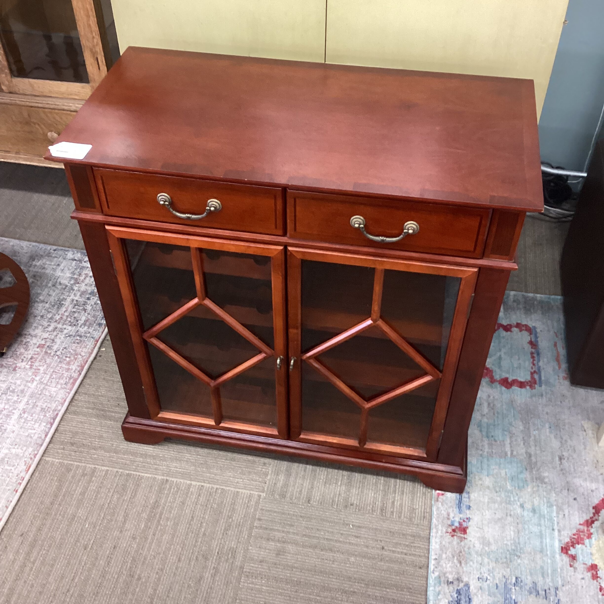 bombay cherry finish wine cabinet