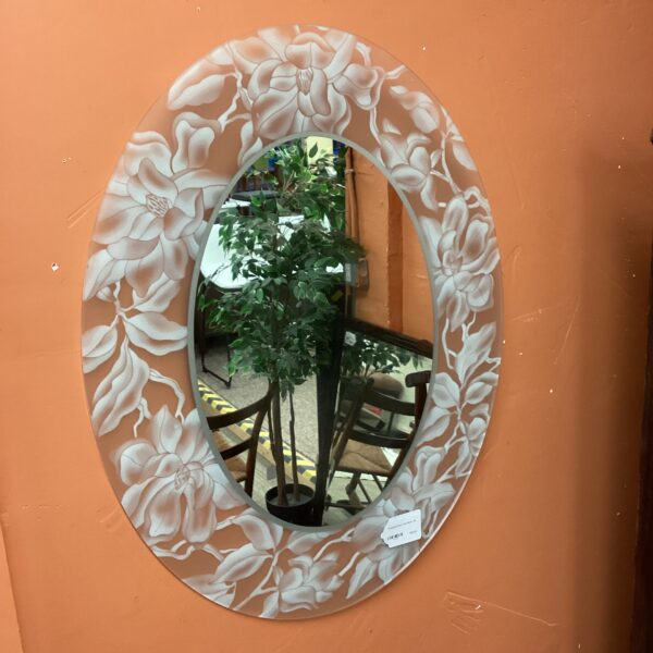 translucent floral oval mirror