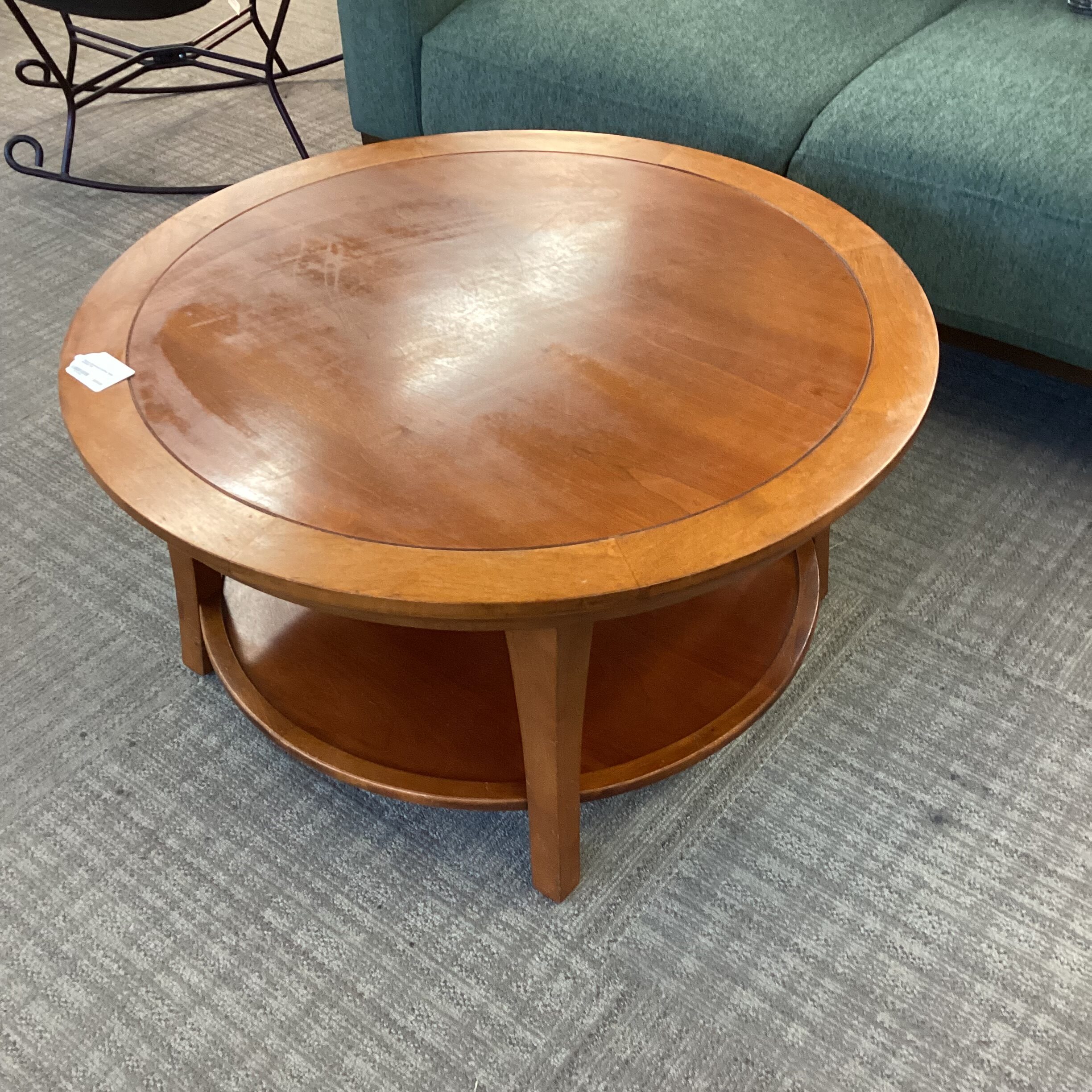 round hardwood coffee table w/shelf