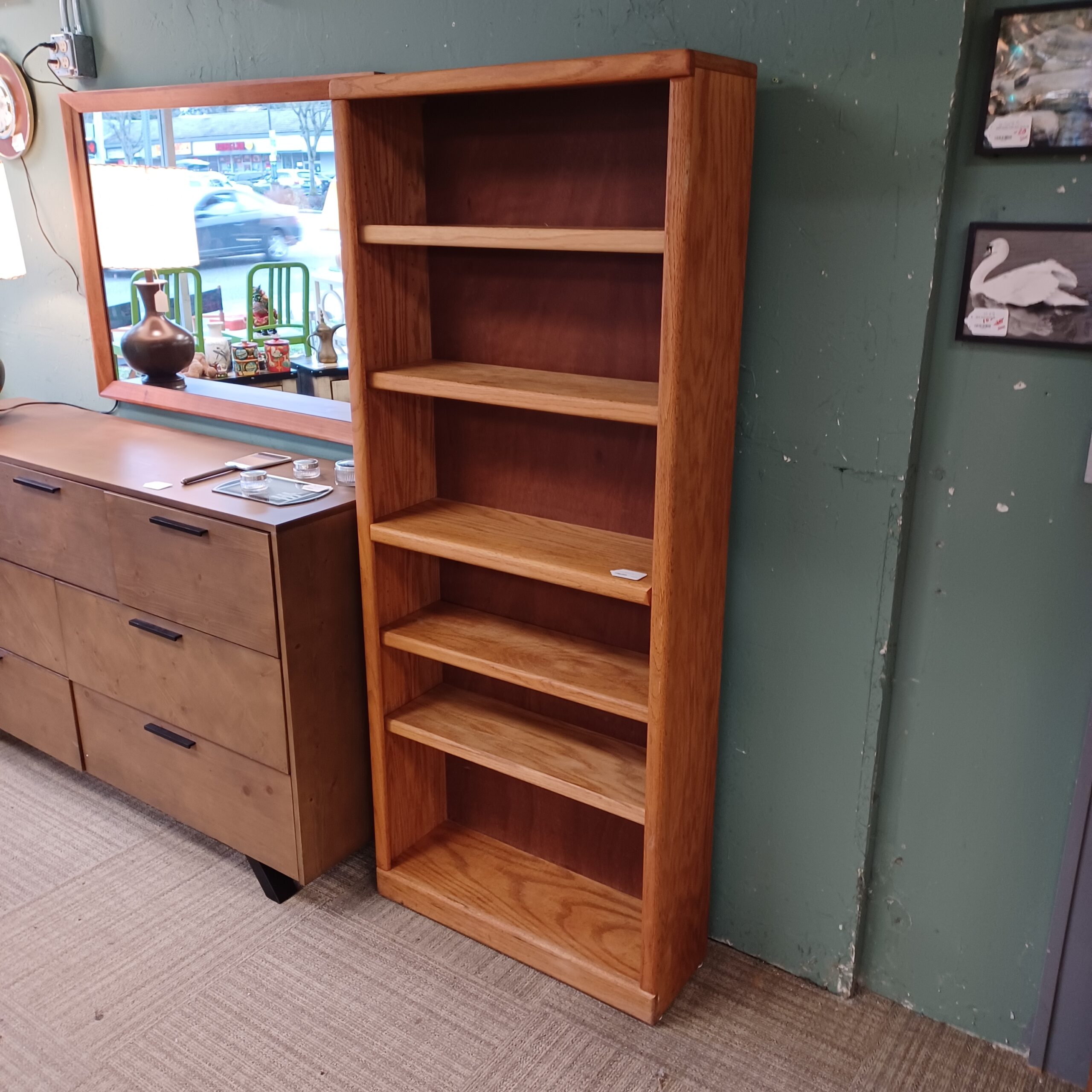 tall oak bookcase w/dark back panel