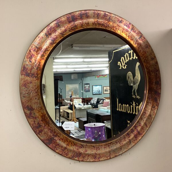 tarnished round mirror