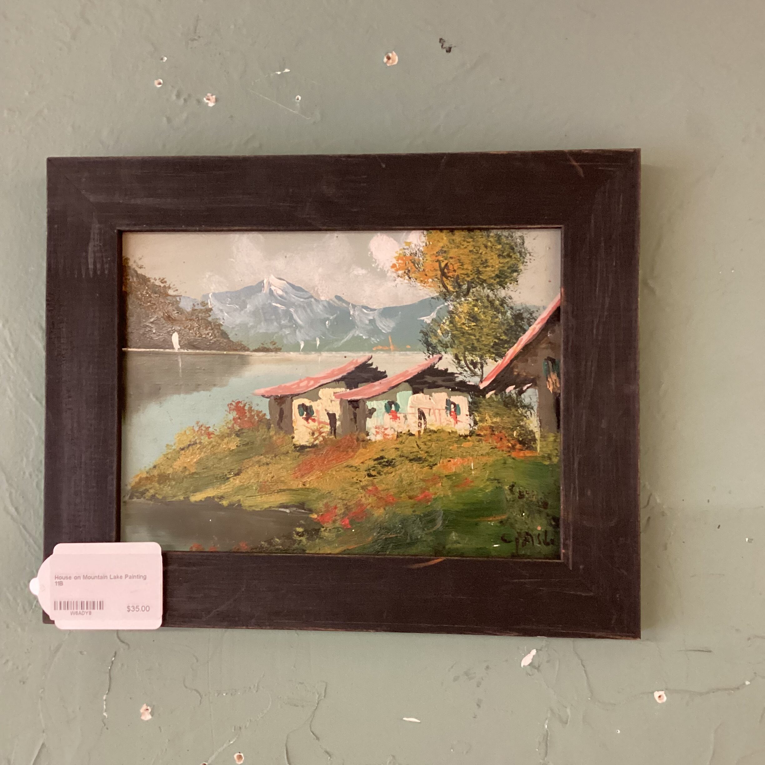 house on mountain lake painting