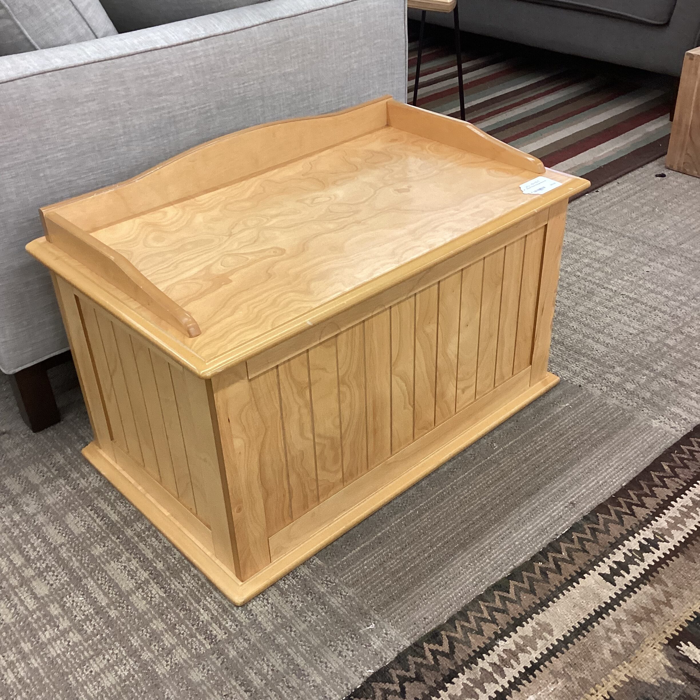 blonde wood storage bench