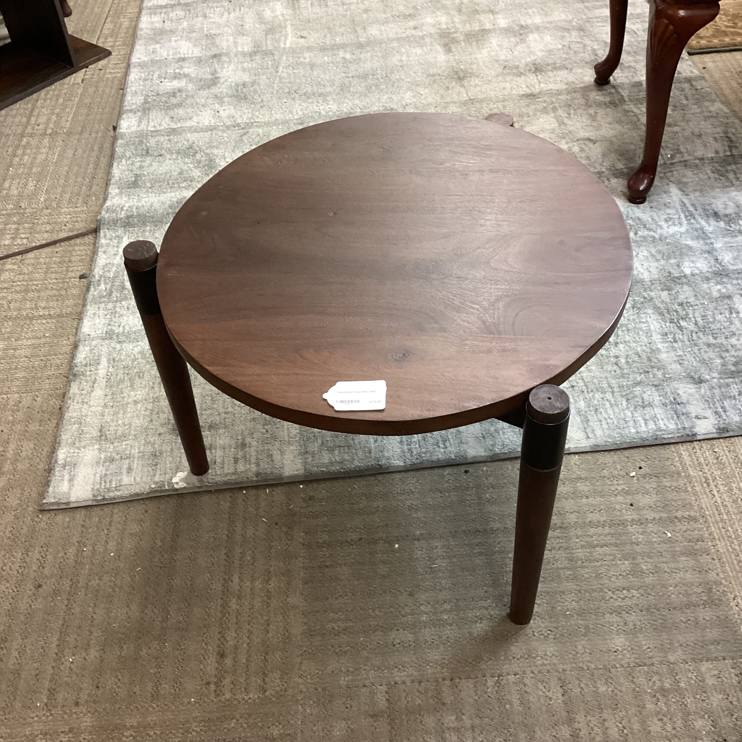 round dark wood side table