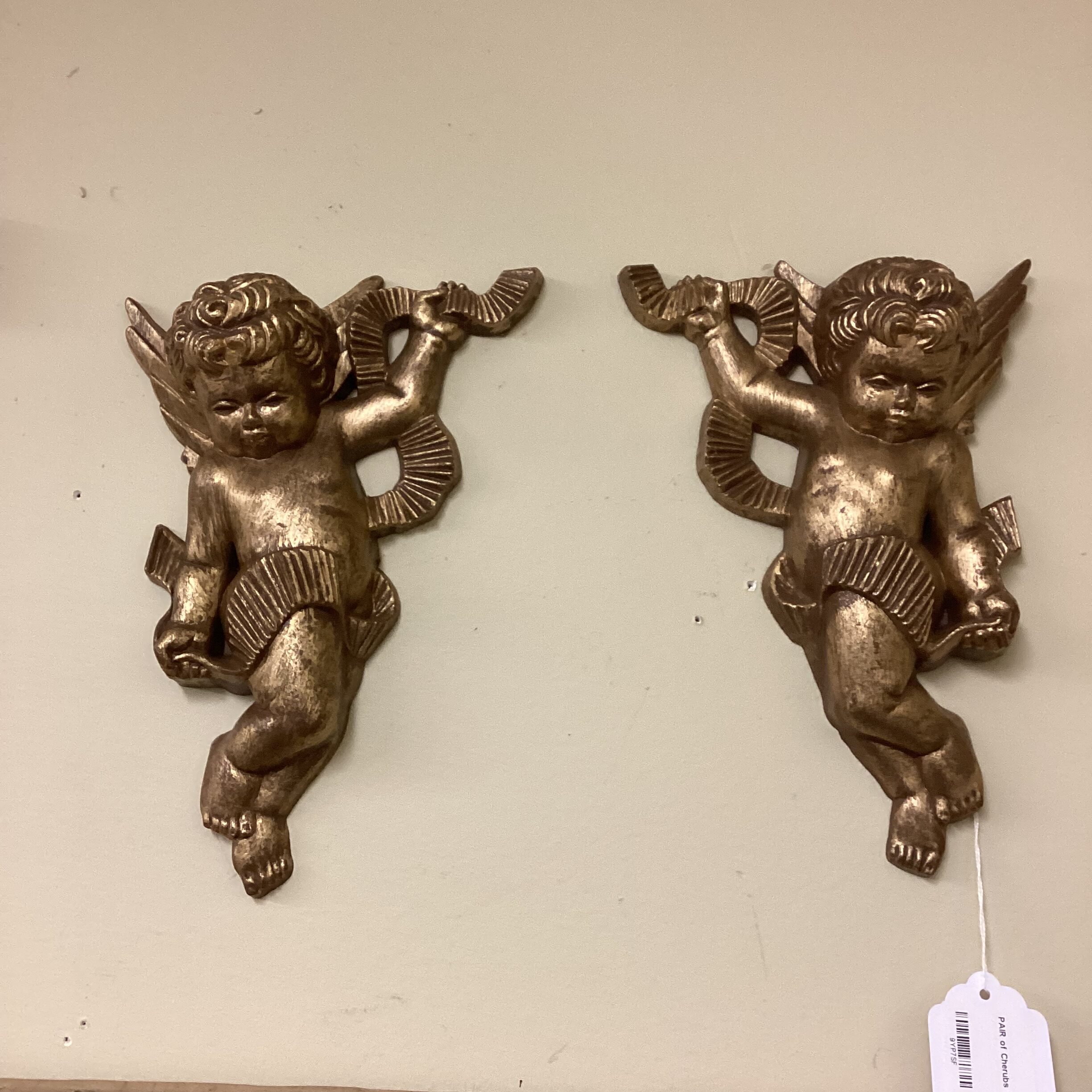 pair of cherubs wall decor