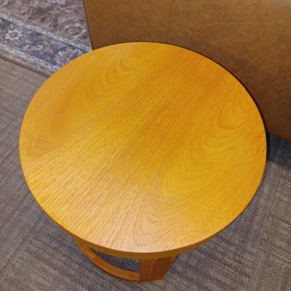 contemporary round blonde hardwood side table