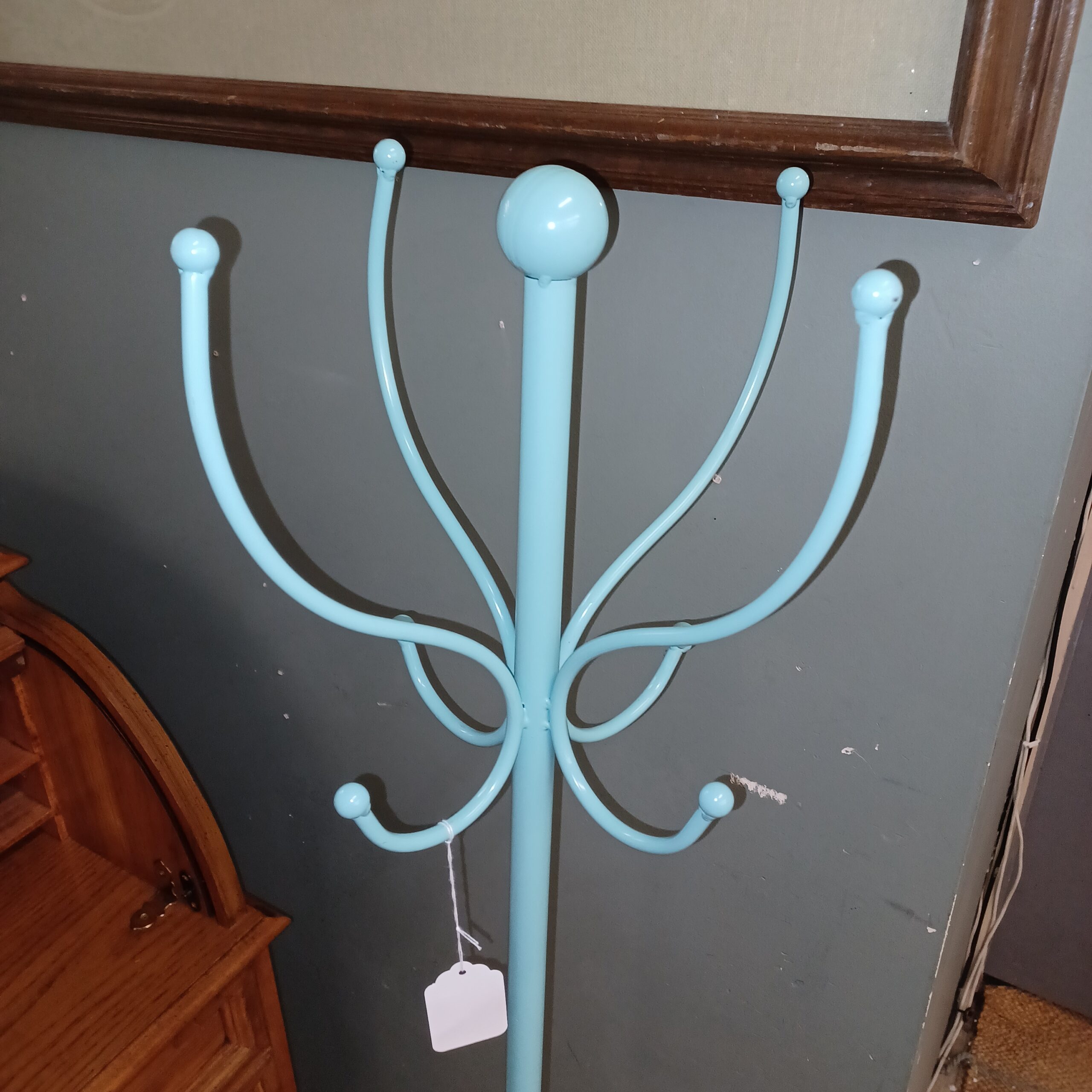 small baby blue coat rack