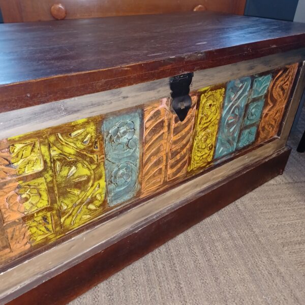 carved panel multicolor chest